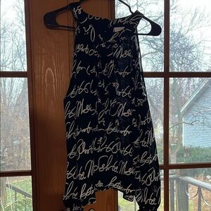 Chic Black and White Script Tank Top w/ long sleeves and open shoulders